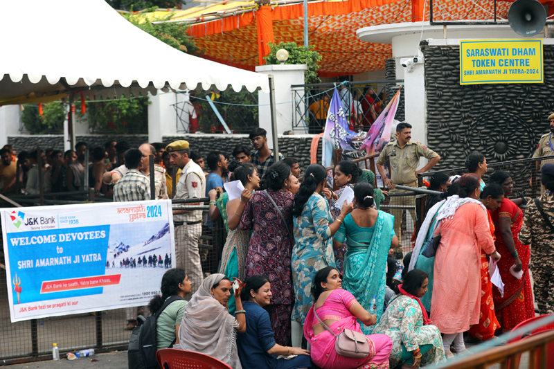 Pilgrims waiting in queues at Saraswati Dham Jammu for registration on Wednesday. -Excelsior/Rakesh