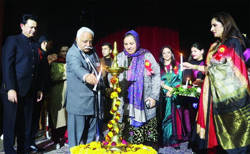 Education Minister Sakina Itoo along with other dignitaries lighting traditional lamp during Annual Day celebration of MMI School, Jammu.-Excelsior/Rakesh